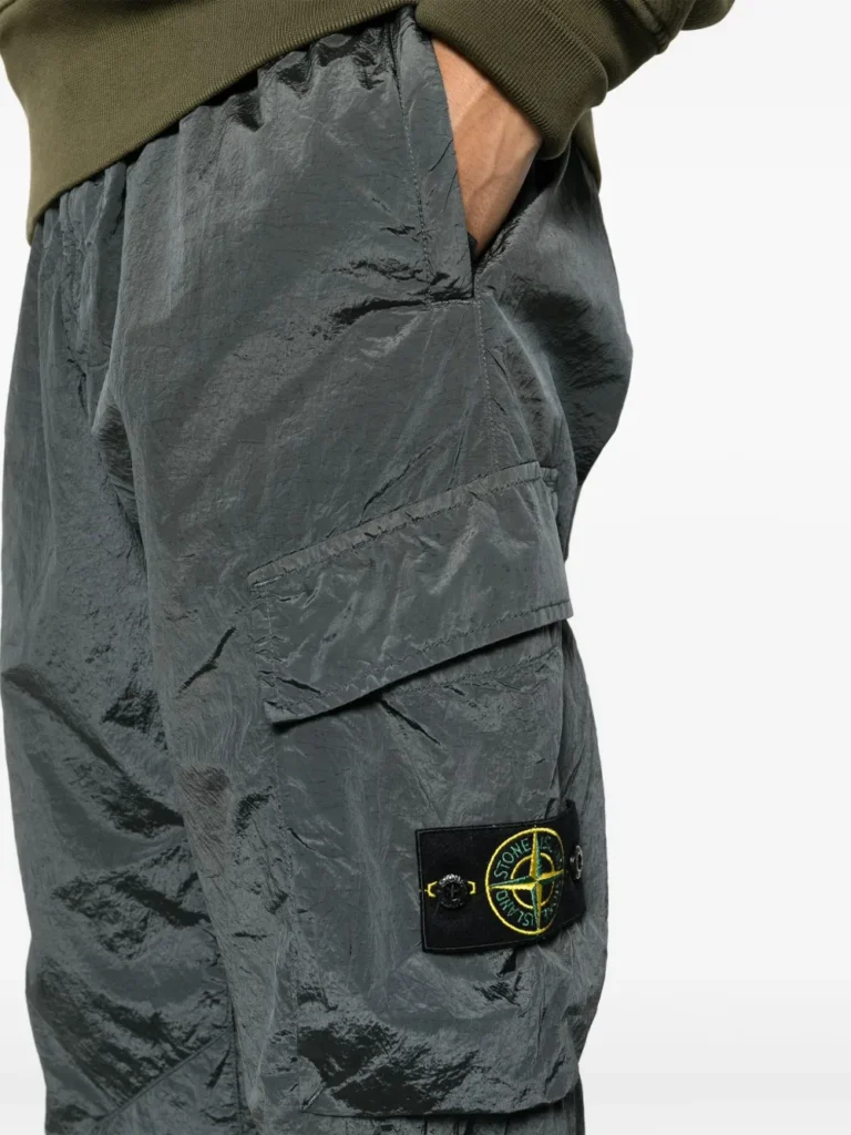 Unikalne spodnie dresowe Stone Island